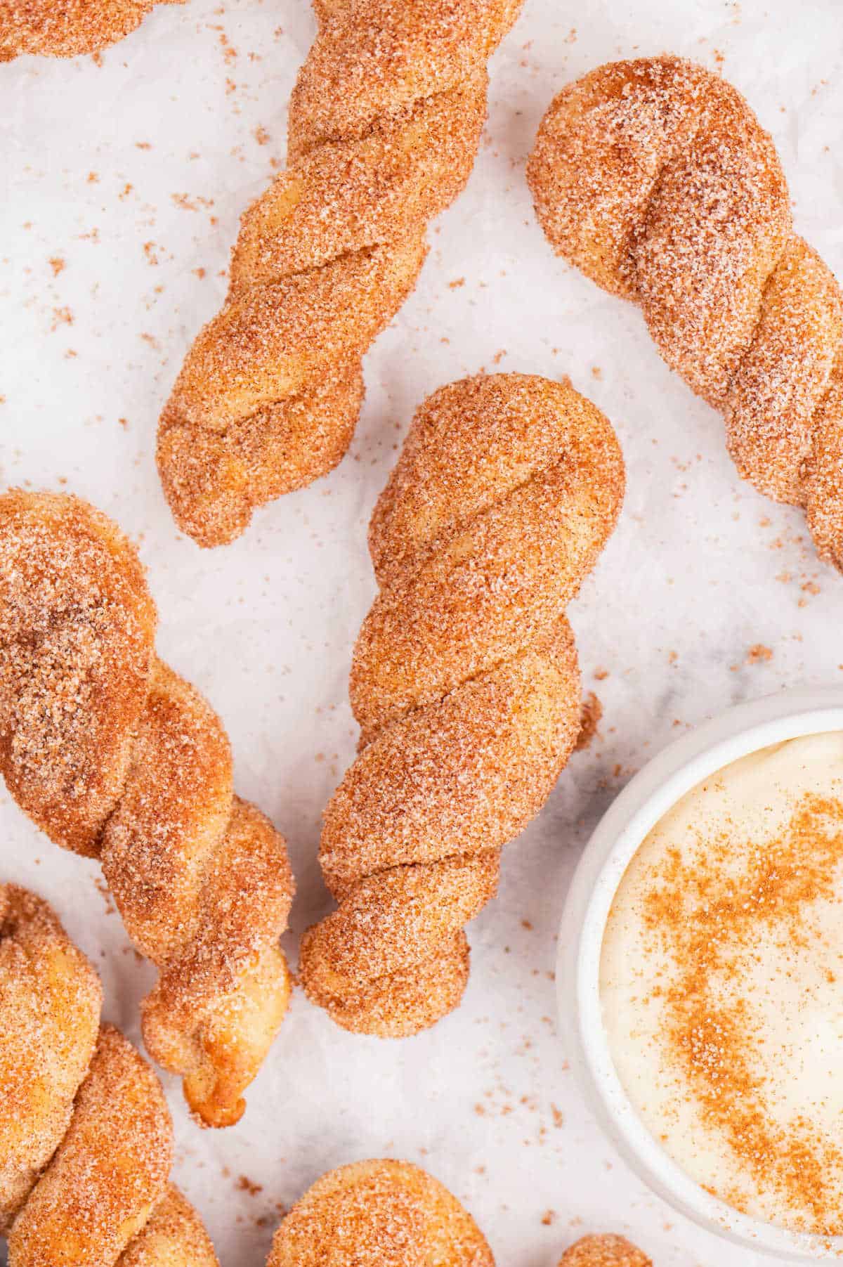 Air fryer cinnamon twists with cream cheese dip.