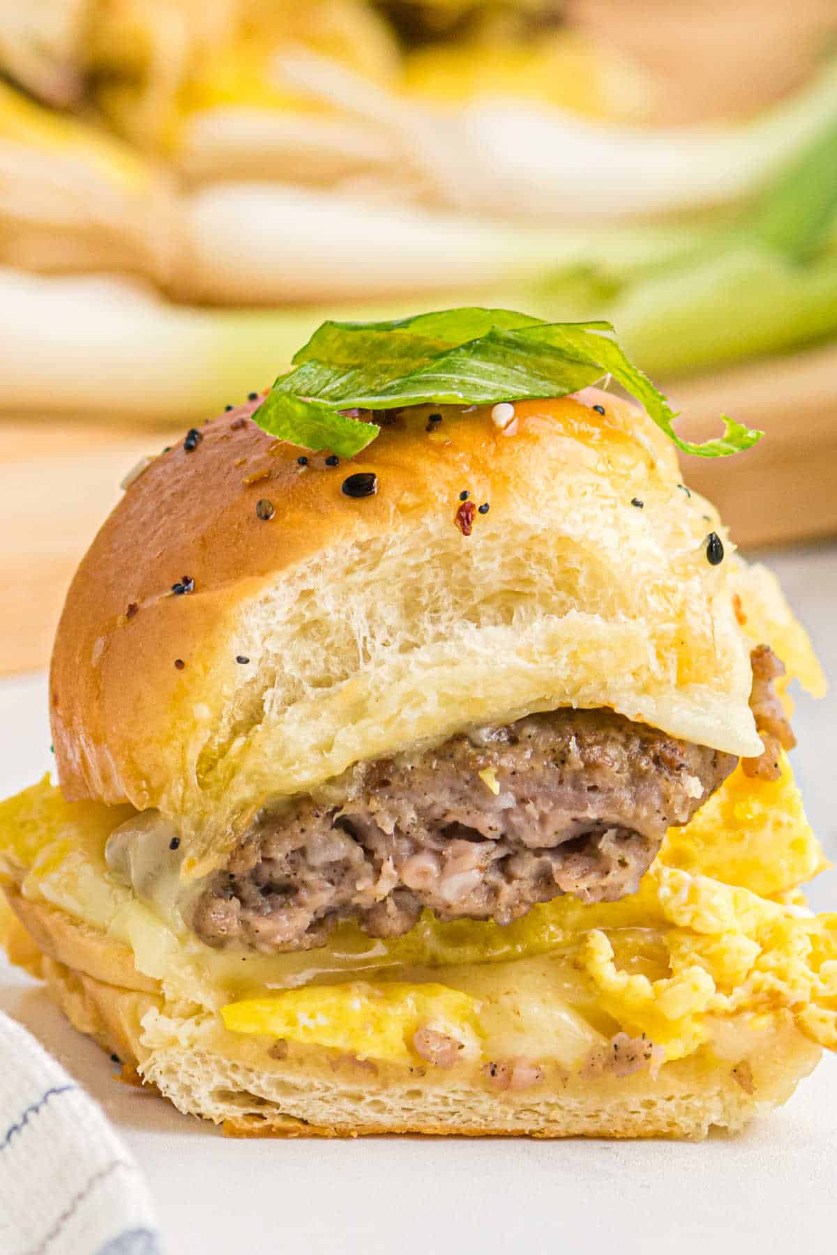 A breakfast slider on a plate.