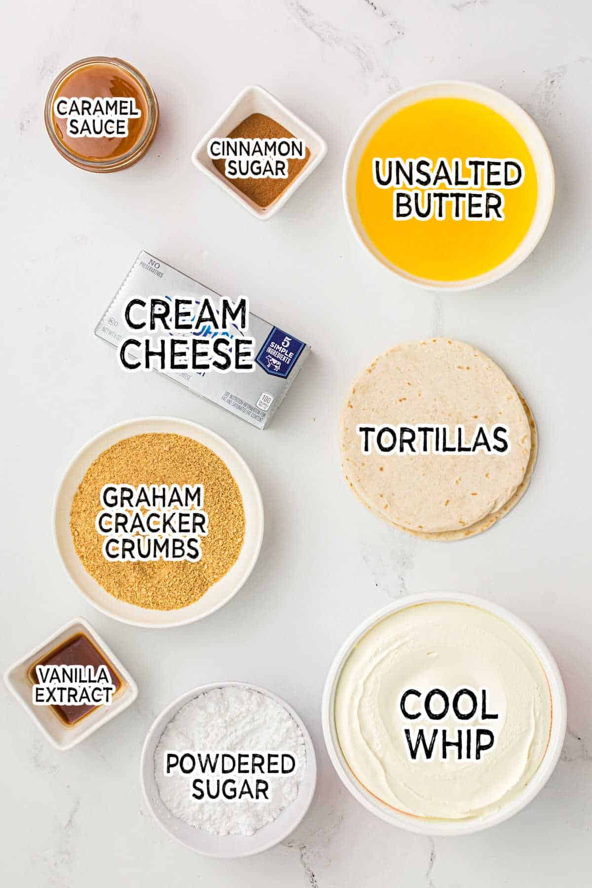 Ingredients on a white counter.