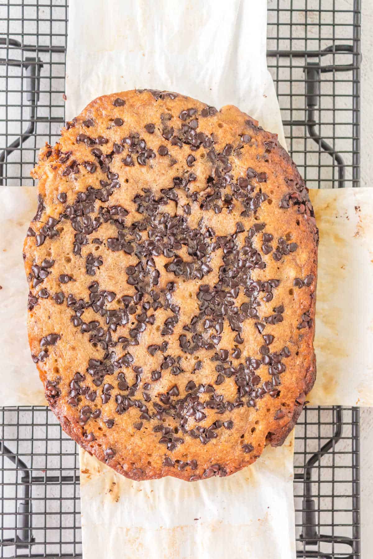 Banana bread on a cooling rack.