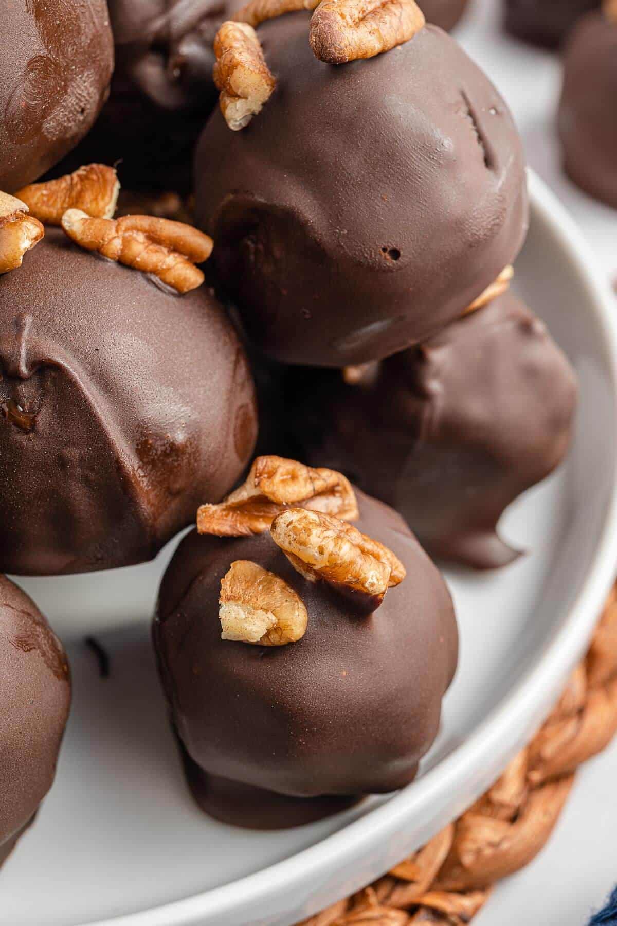 Pecan pie balls on a plate.