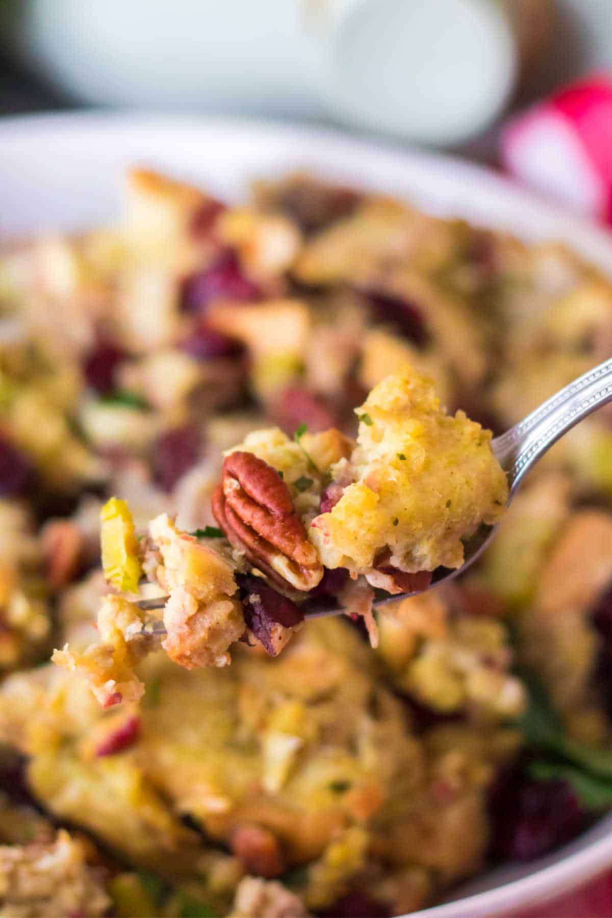 Cranberry pecan stuffing on a fork.