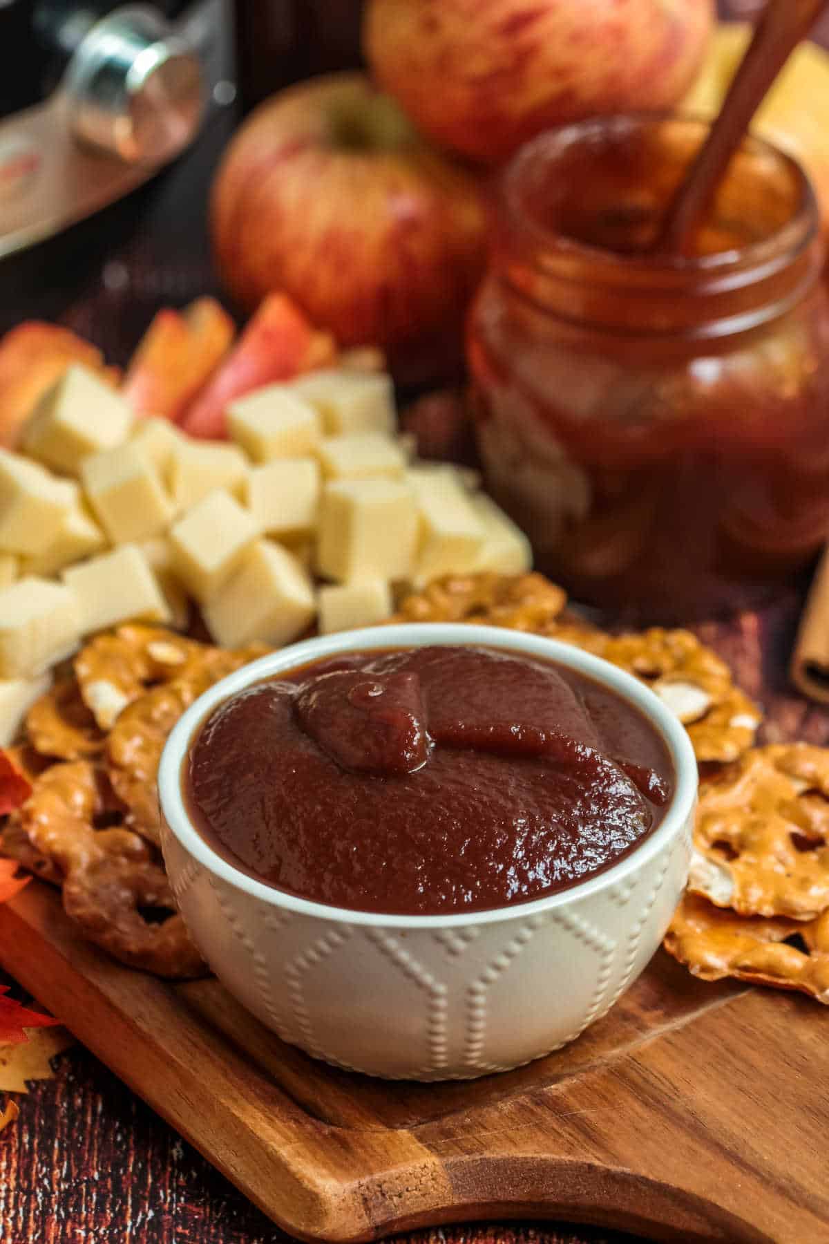 A white bowl of apple butter.