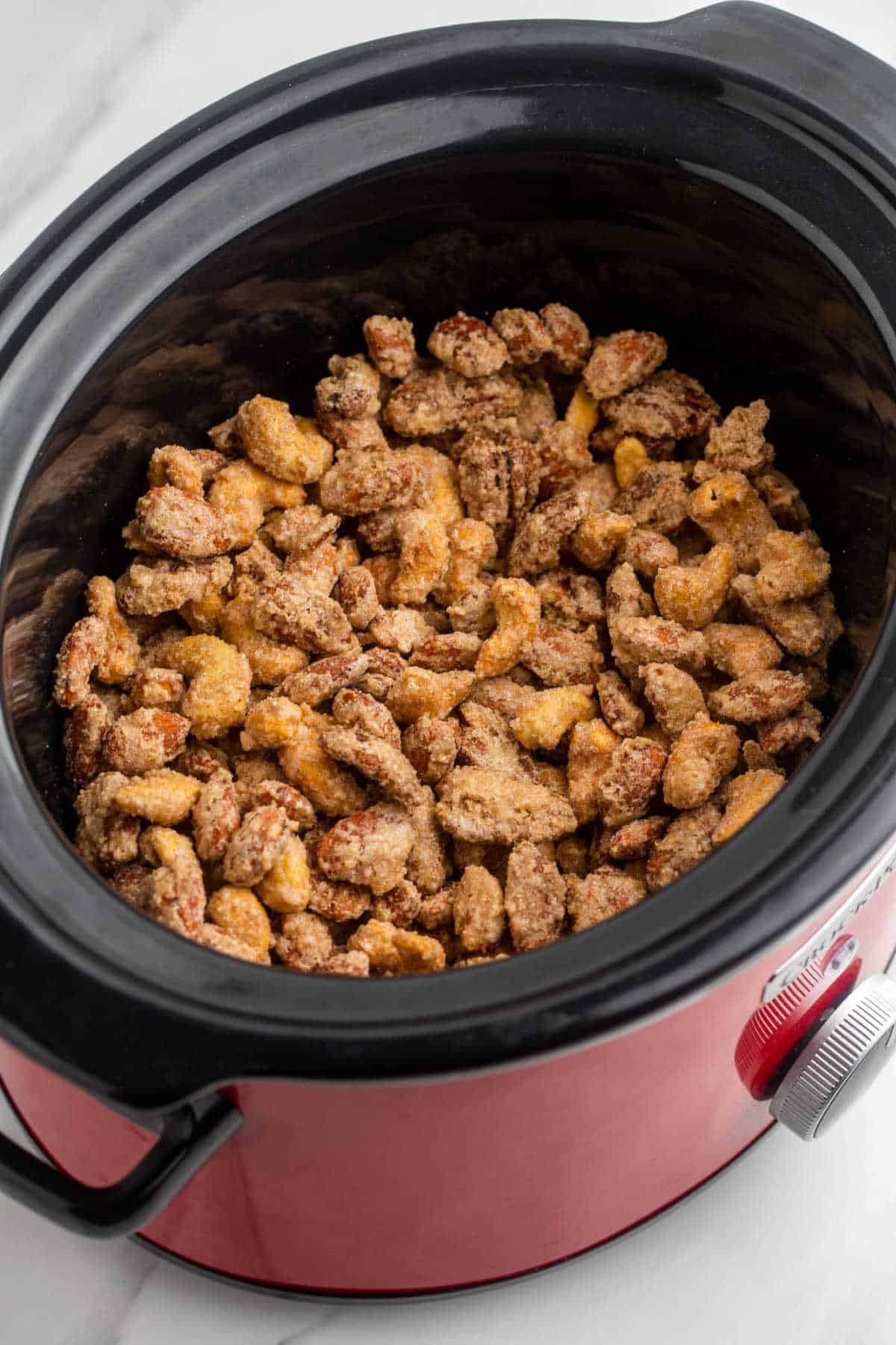Candied nuts in a crockpot.