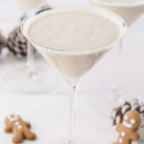 A glass of the recipe surrounded by holiday decor.