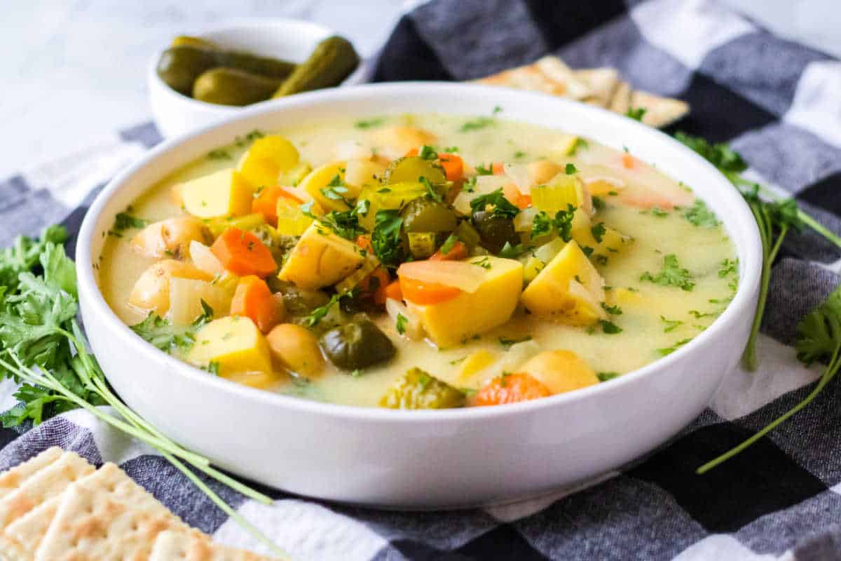 A bowl of dill pickle soup.