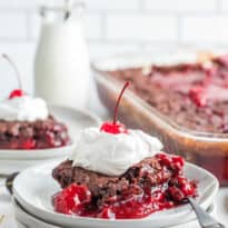 A piece of cake on a plate.
