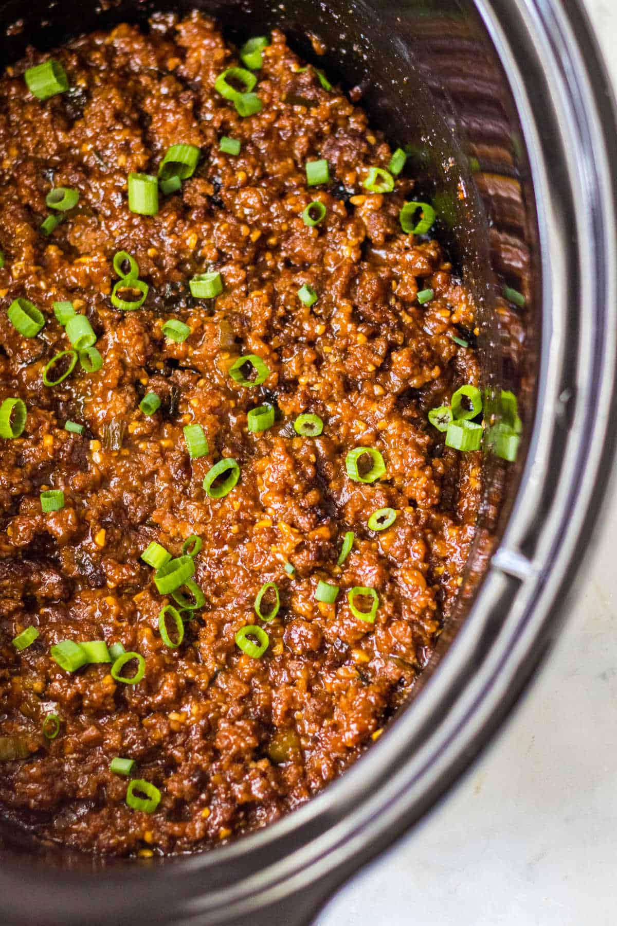 Korean sloppy joe meat in a slow cooker.