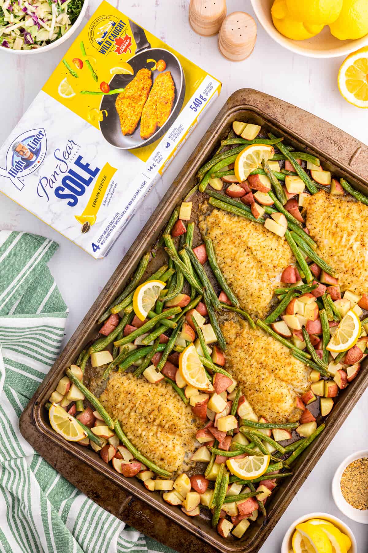 Lemon Pepper Sole Sheet Pan dinner with the product box beside it.