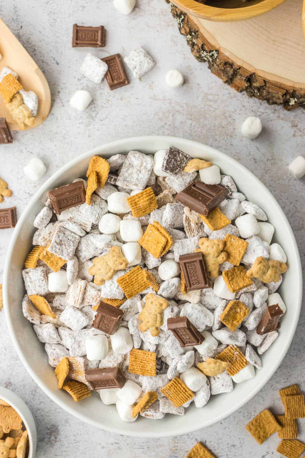 S'mores puppy chow in a white bowl.