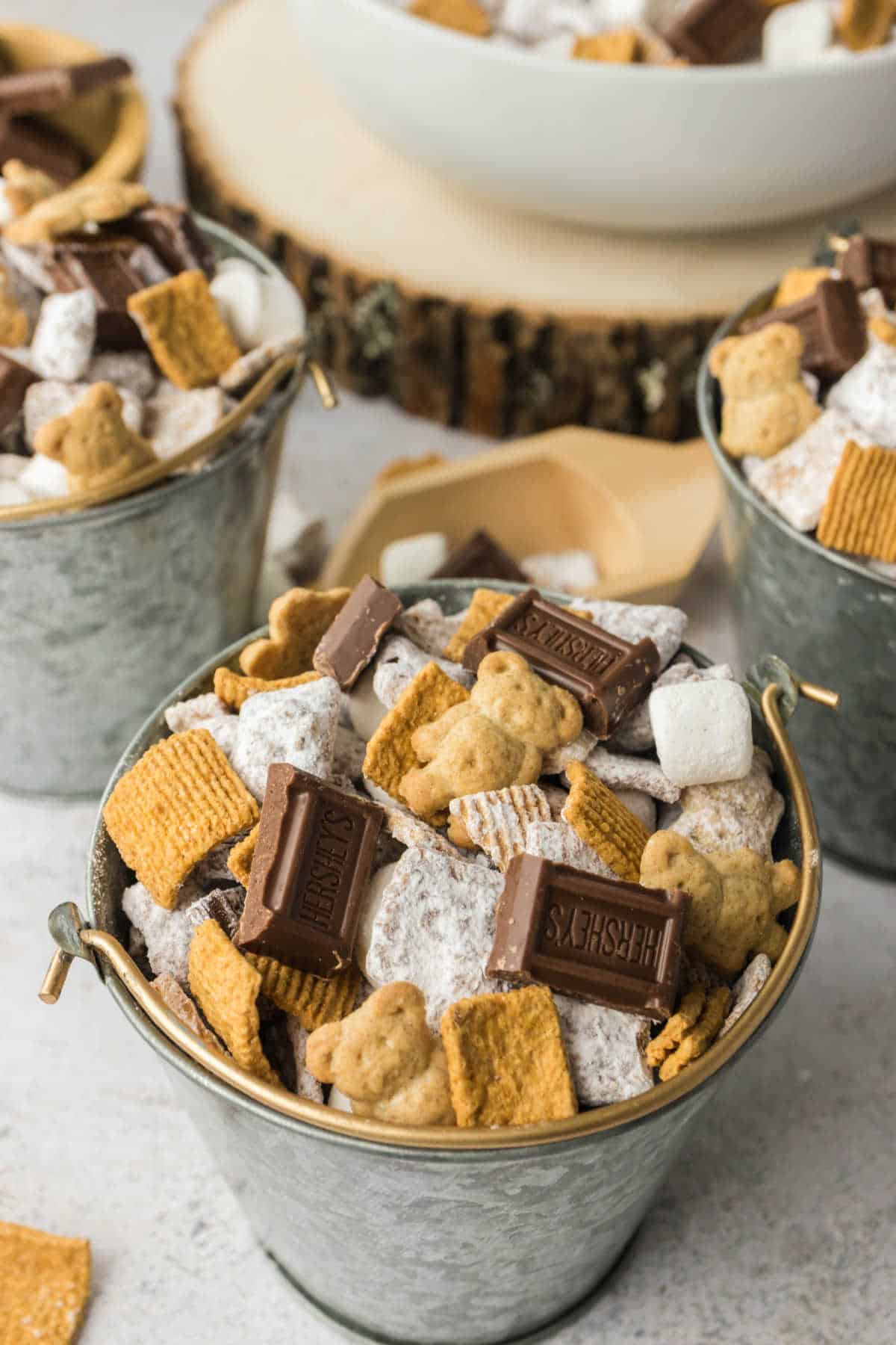 S'mores Puppy Chow in a metal bucket.