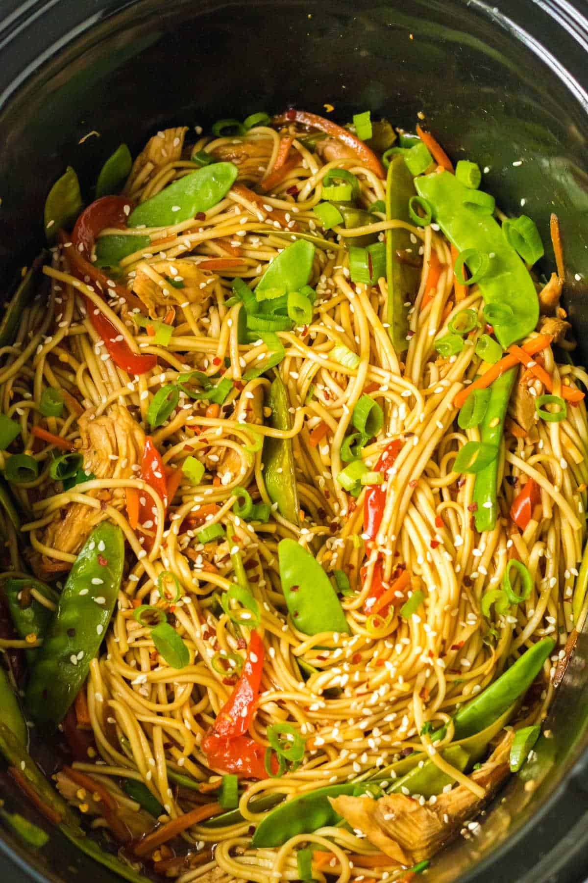 Chicken lo mein in a slow cooker.