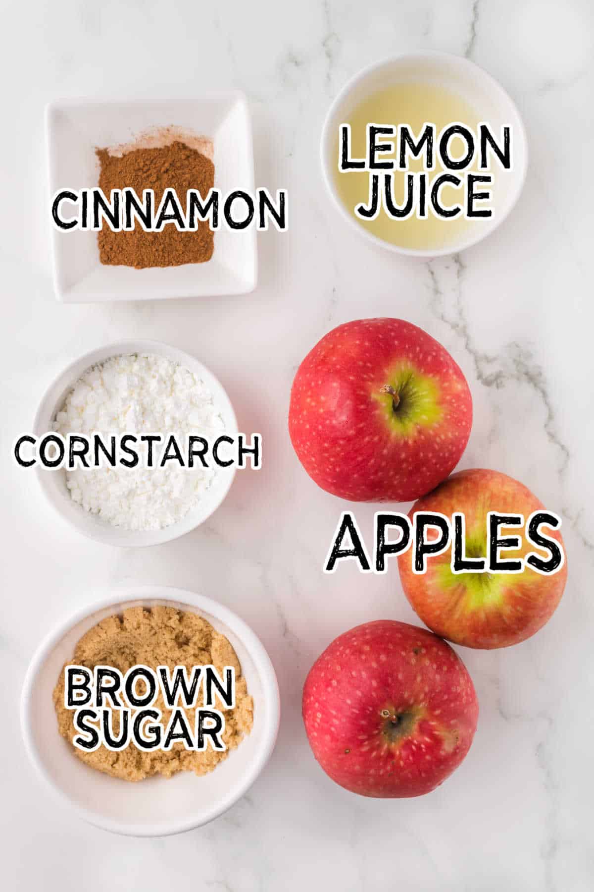 Ingredients on a white marble counter.