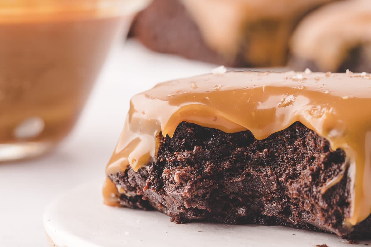 A salted caramel brownie with a bite out of it.