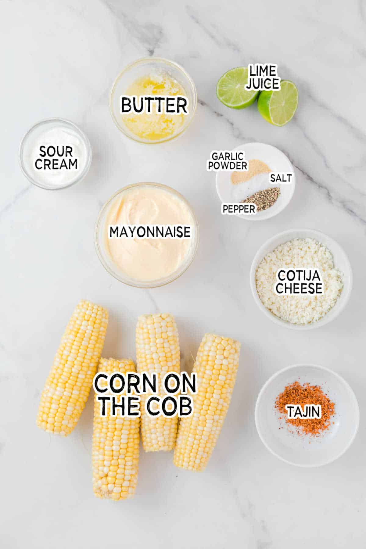 Ingredients on a white marble counter.