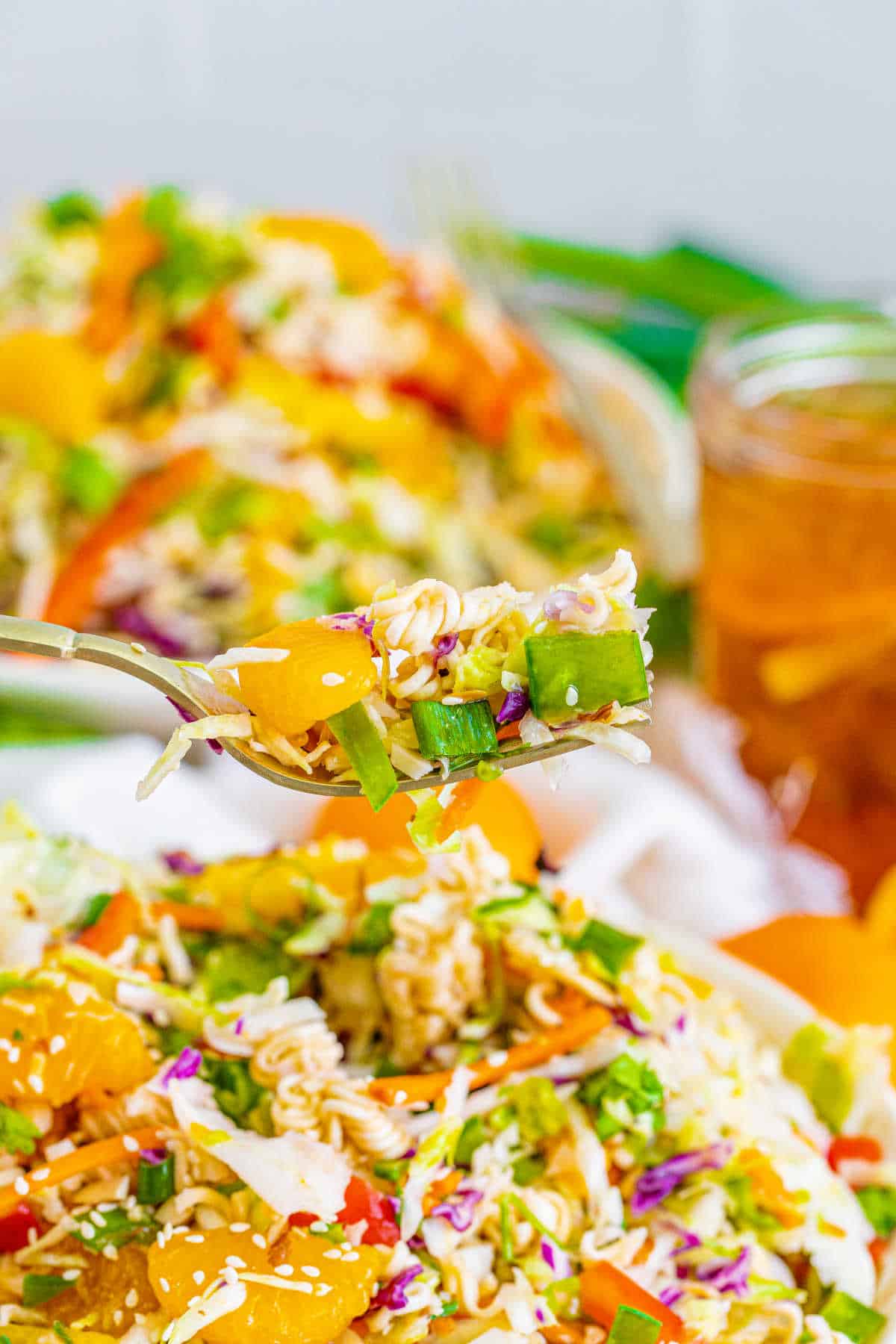 A fork with ramen noodle salad.