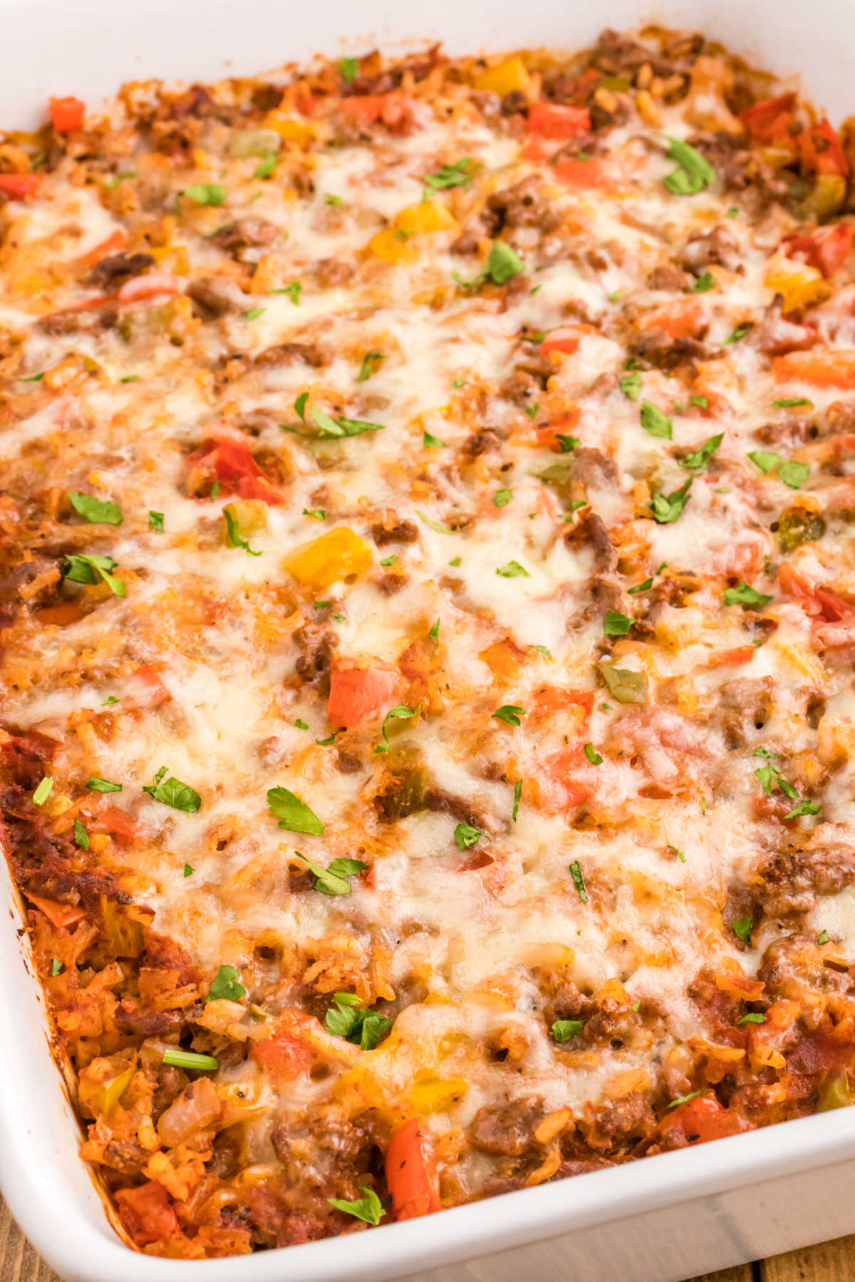 Stuffed pepper casserole in a white pan.