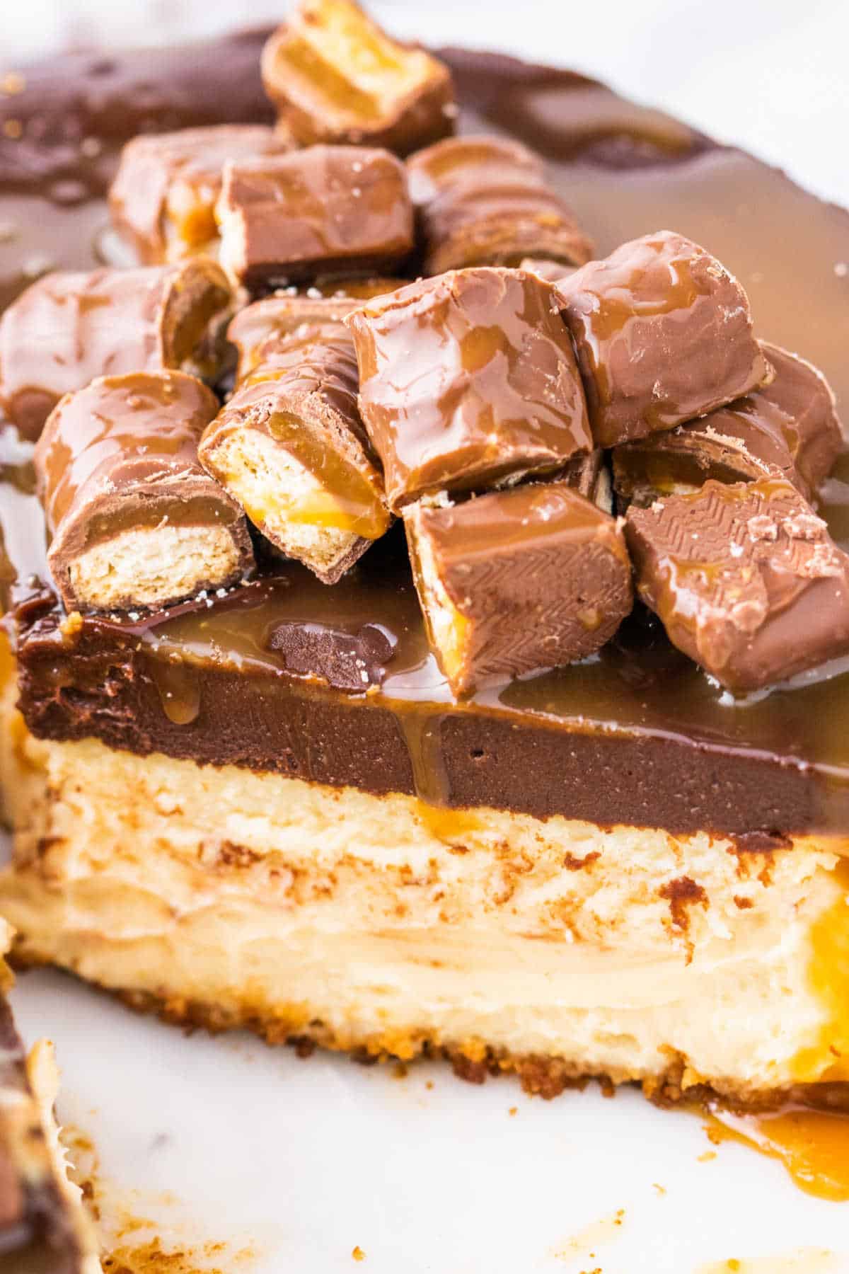 A slice of Twix Cheesecake.