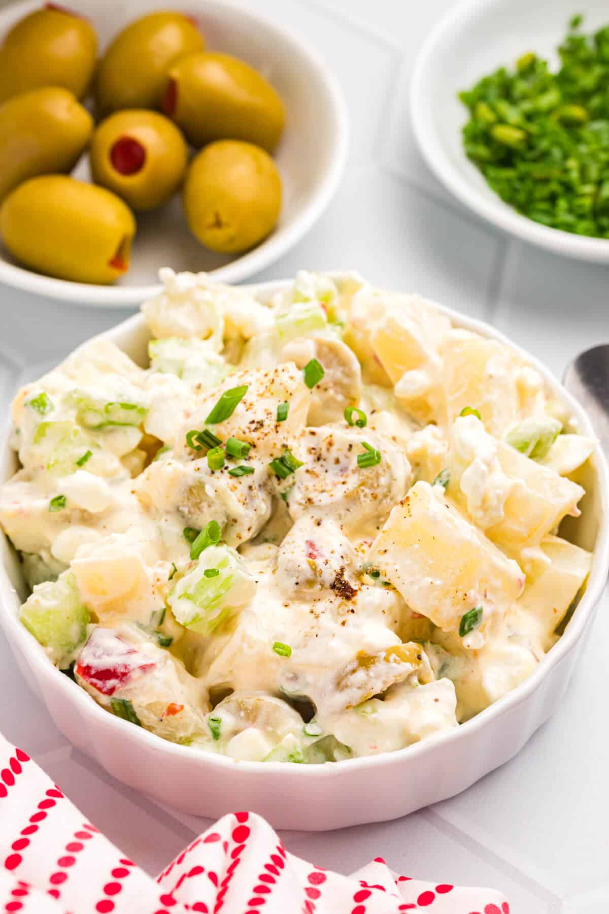 A bowl of cheese potato salad.