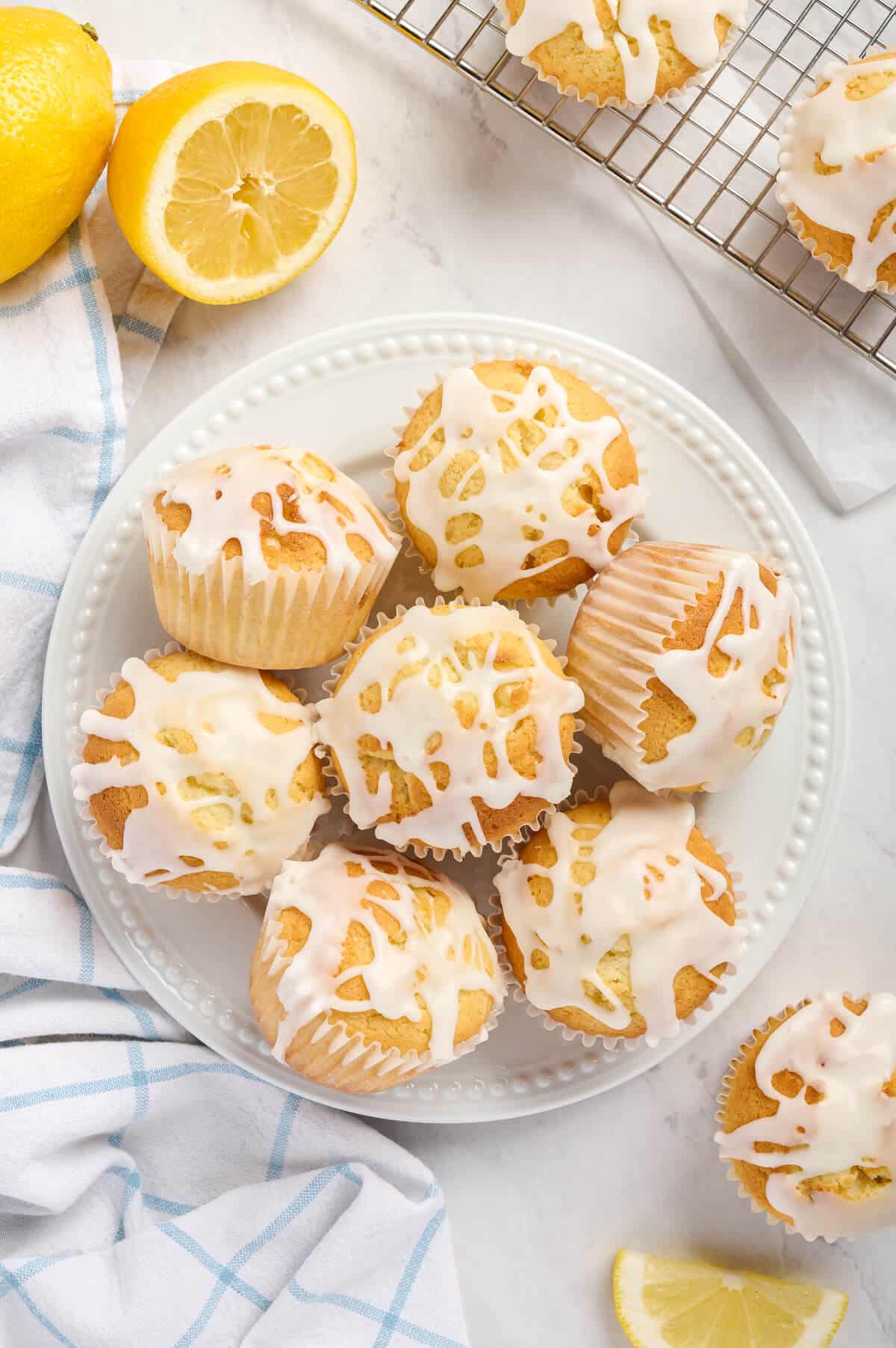 Lemon pound cake muffins on a plate.