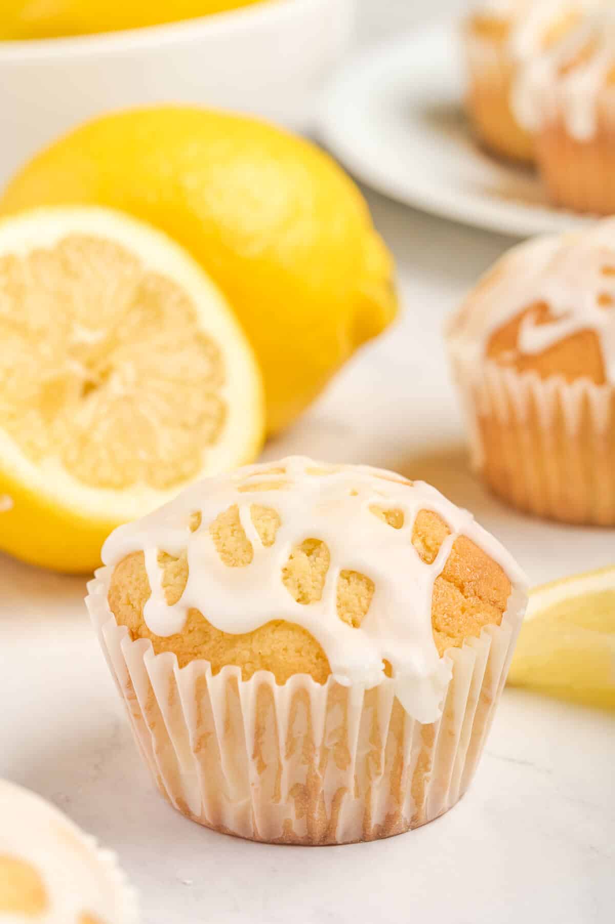 A lemon pound cake muffins on a white surface.