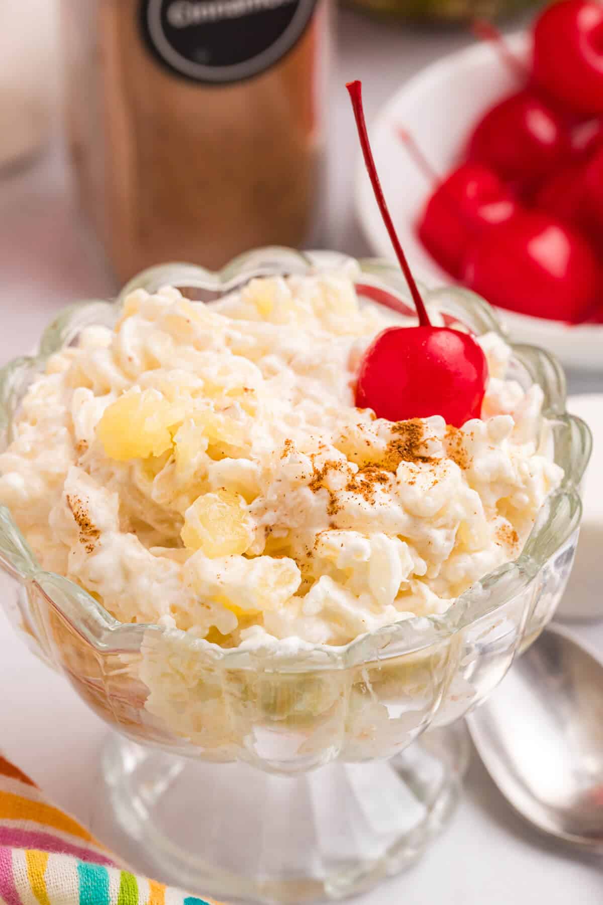 Pineapple rice pudding in a parfait dish.
