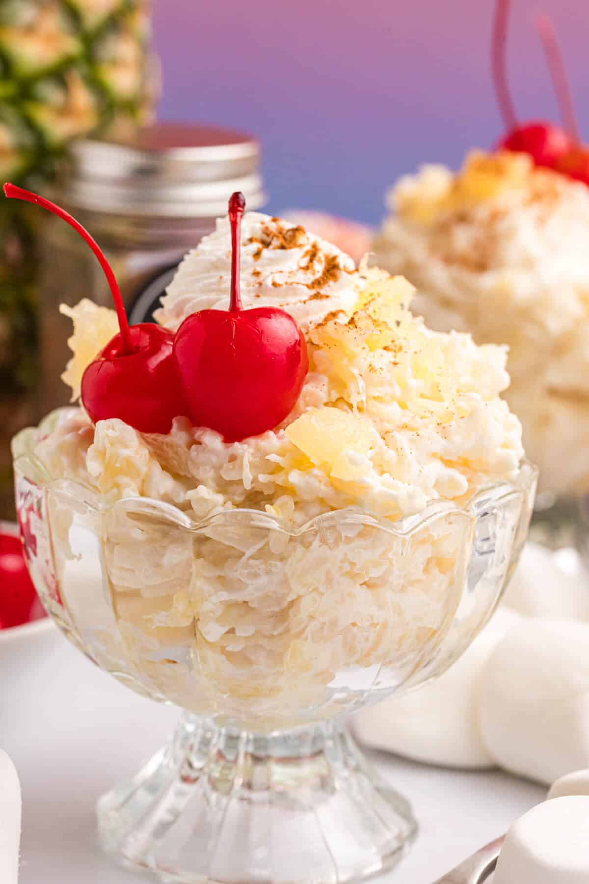 Pineapple rice pudding in a parfait dish.