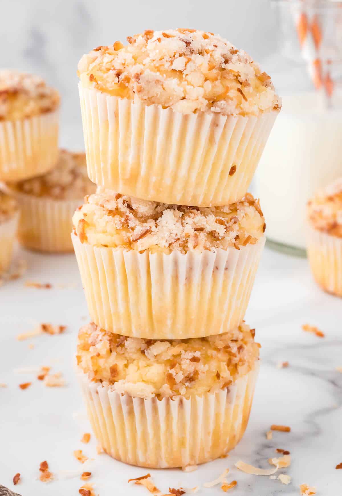 A stack of toasted coconut muffins.