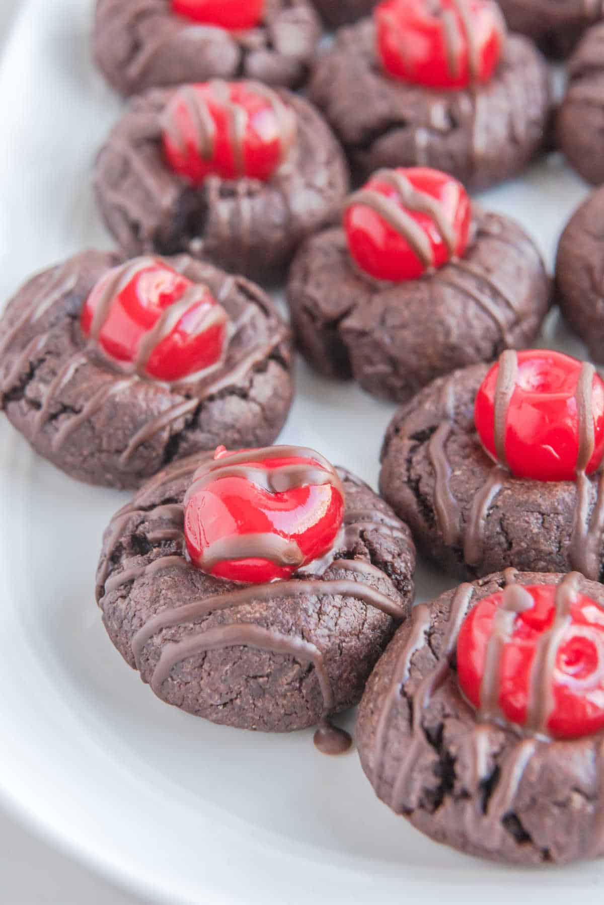 Chocolate cherry cookies on a plate.