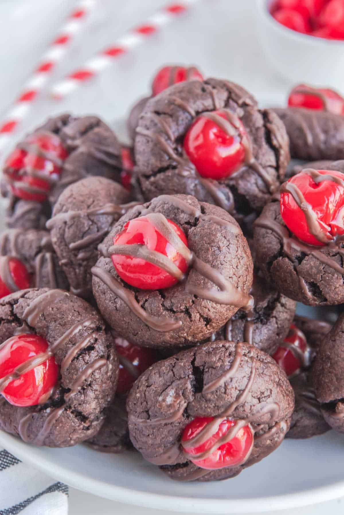 Chocolate cherry cookies on a plate.