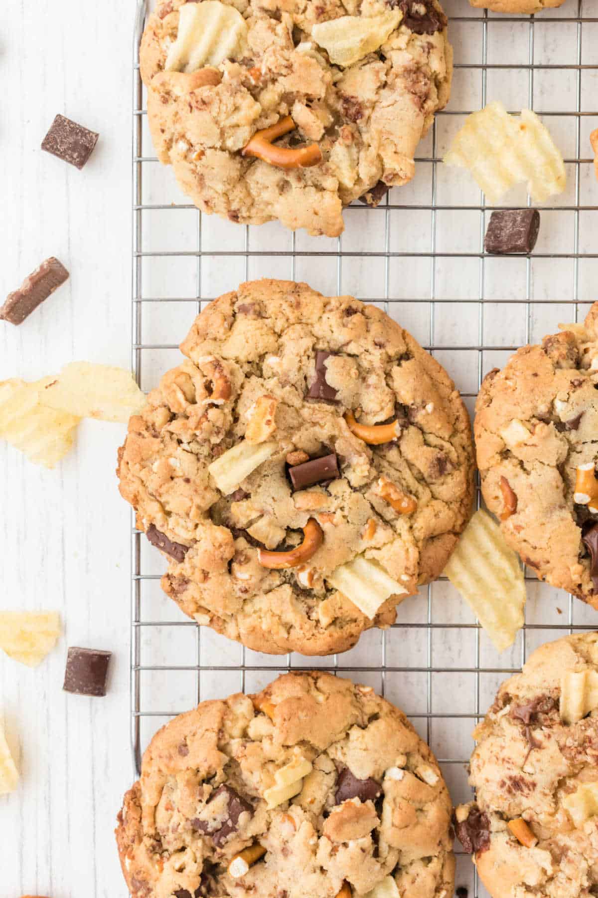 Kitchen sink cookies on a wire rack.