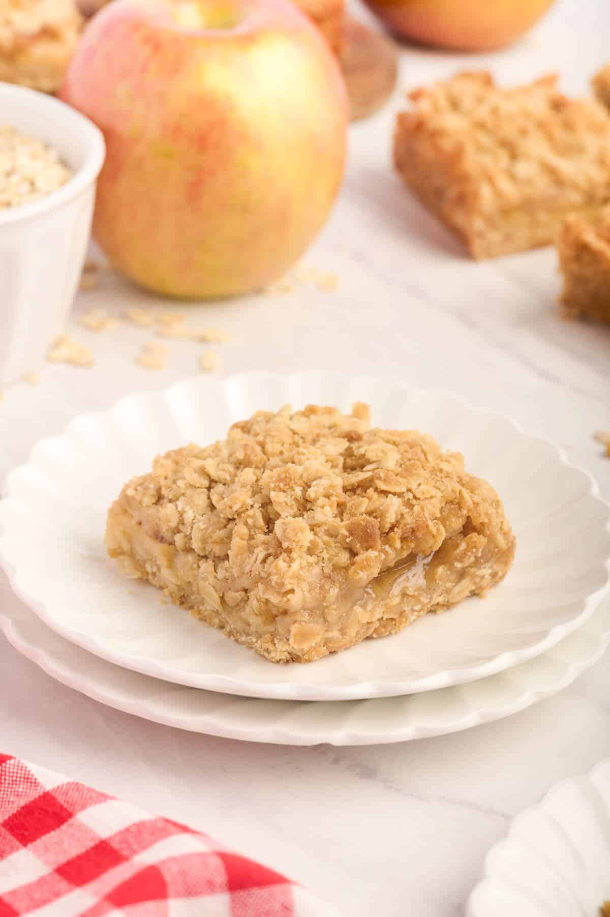 An apple crisp bar on a plate.