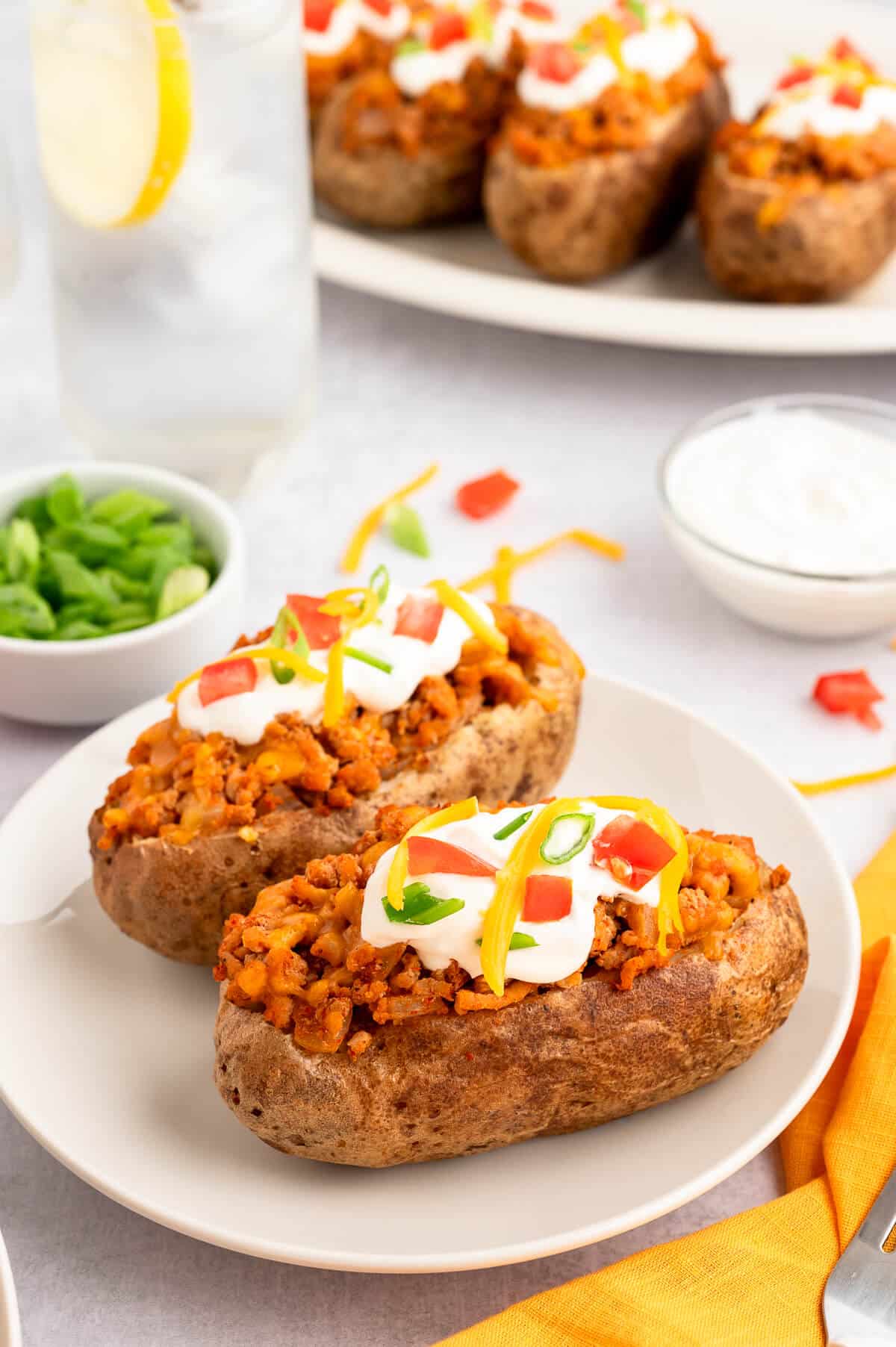 Chicken taco twice-baked potatoes on a plate.