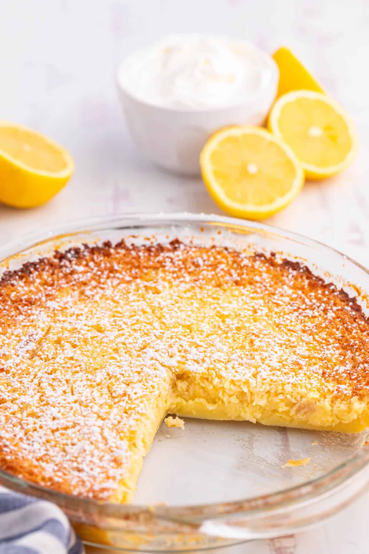 Lemon Impossible Pie with slices removed.