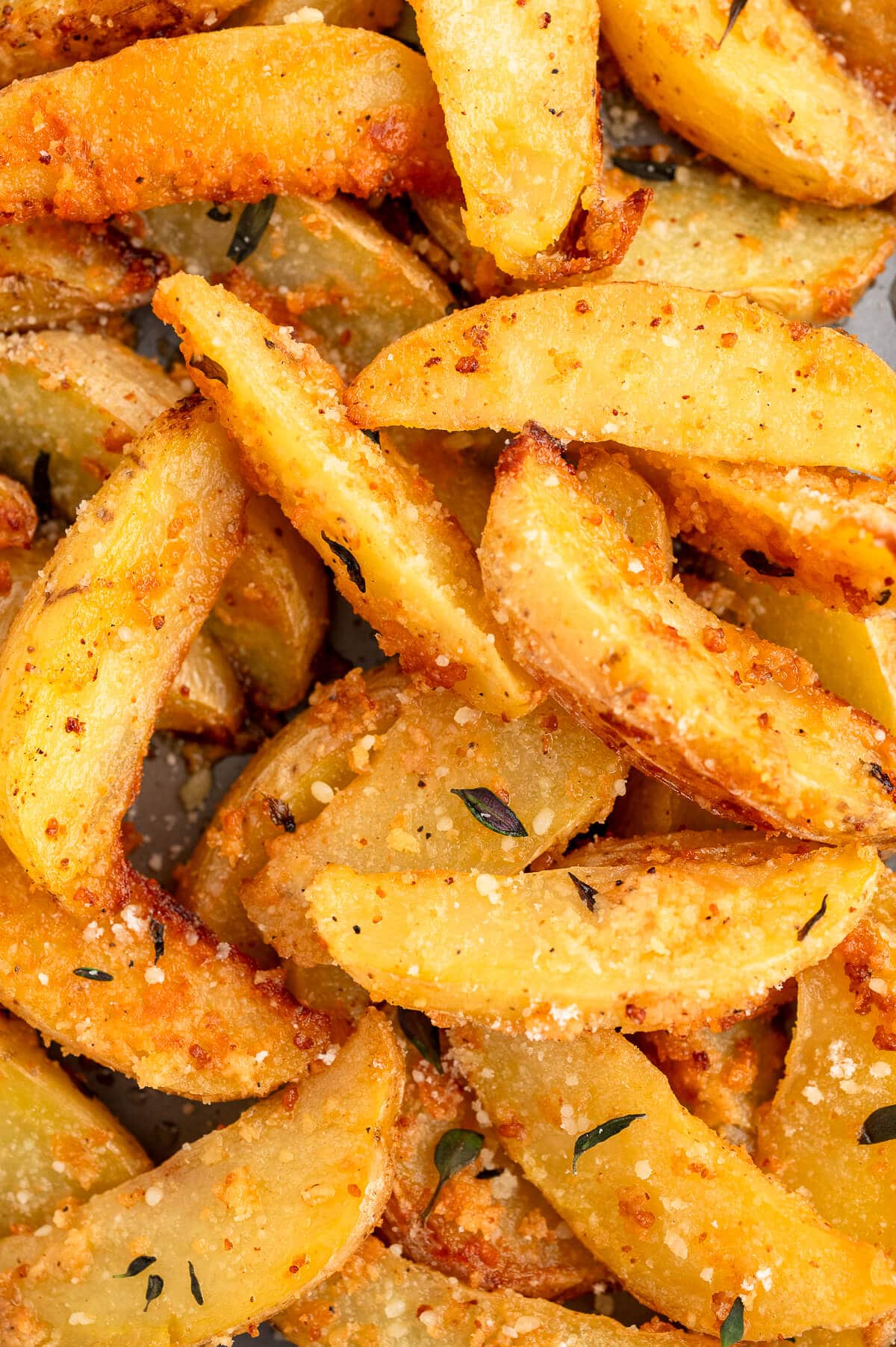 Close up of parmesan thyme roasted potatoes.