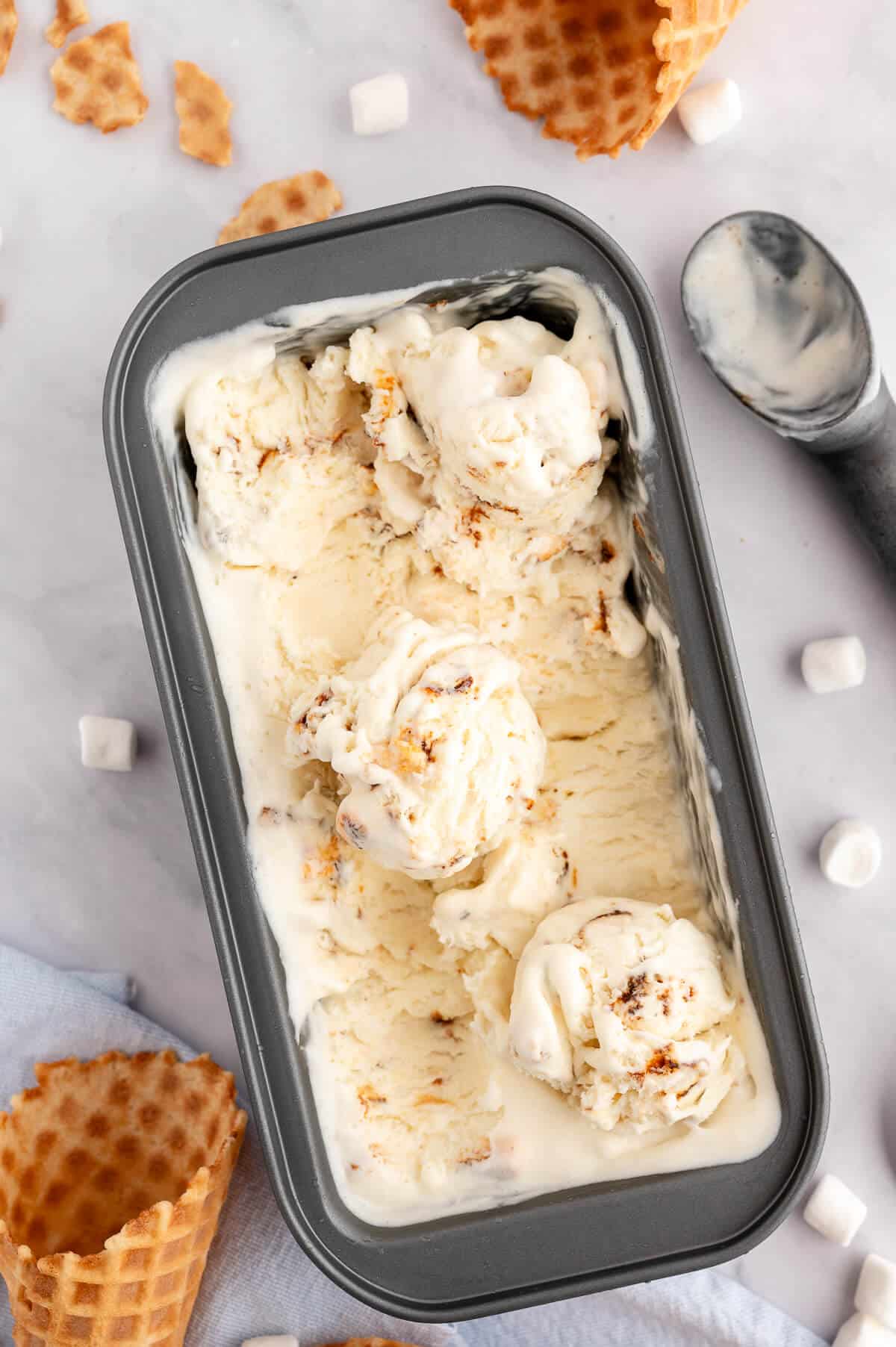 A loaf pan of toasted marshmallow ice cream.