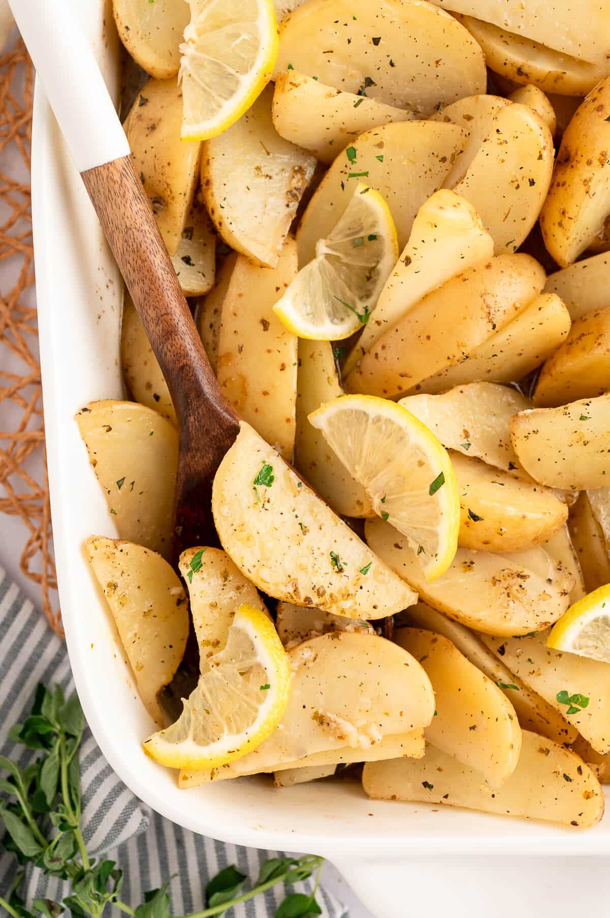 The recipe in a serving pan with a serving spoon.