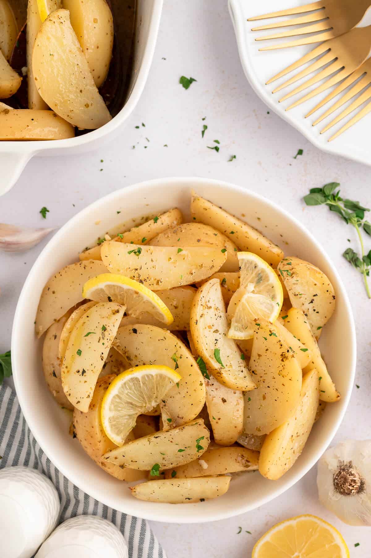 A bowl of lemon roasted potatoes.