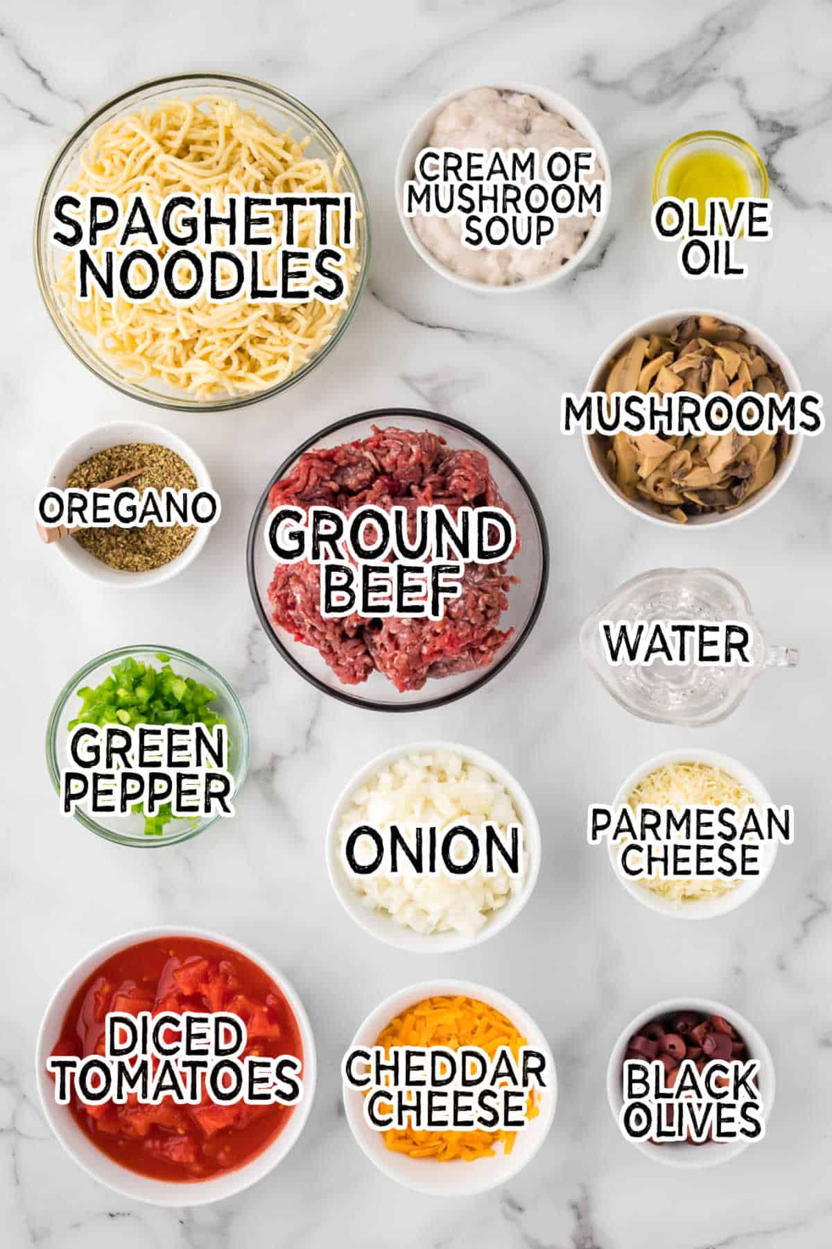Ingredients on a white marble counter.