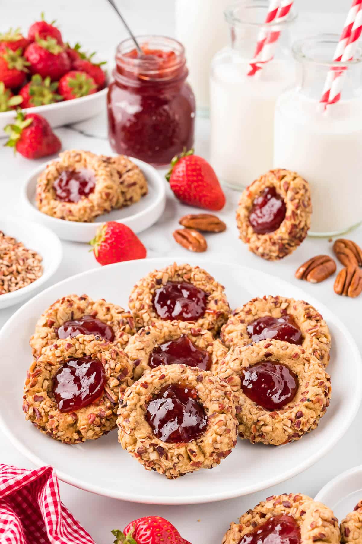 Thumbprint cookies on a plate.