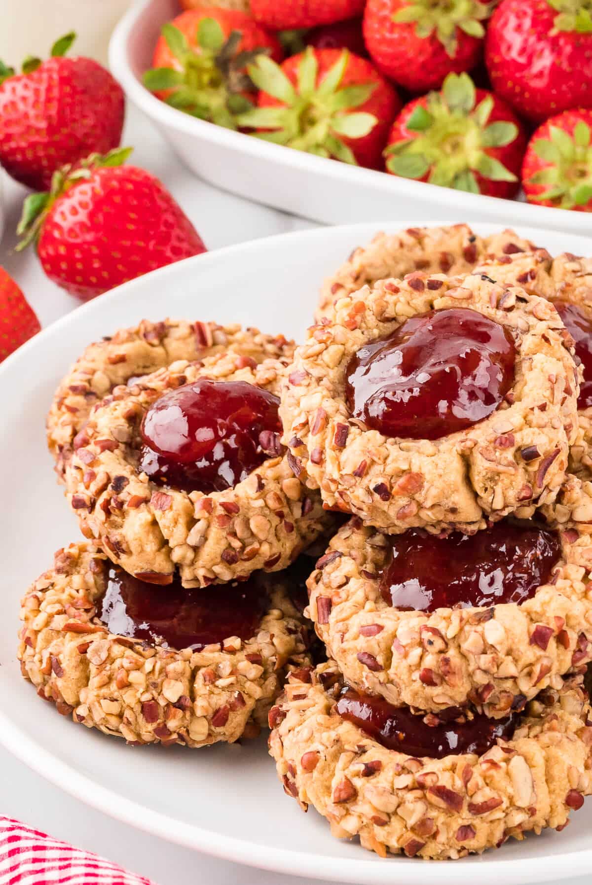 Thumbprint cookies on a plate.