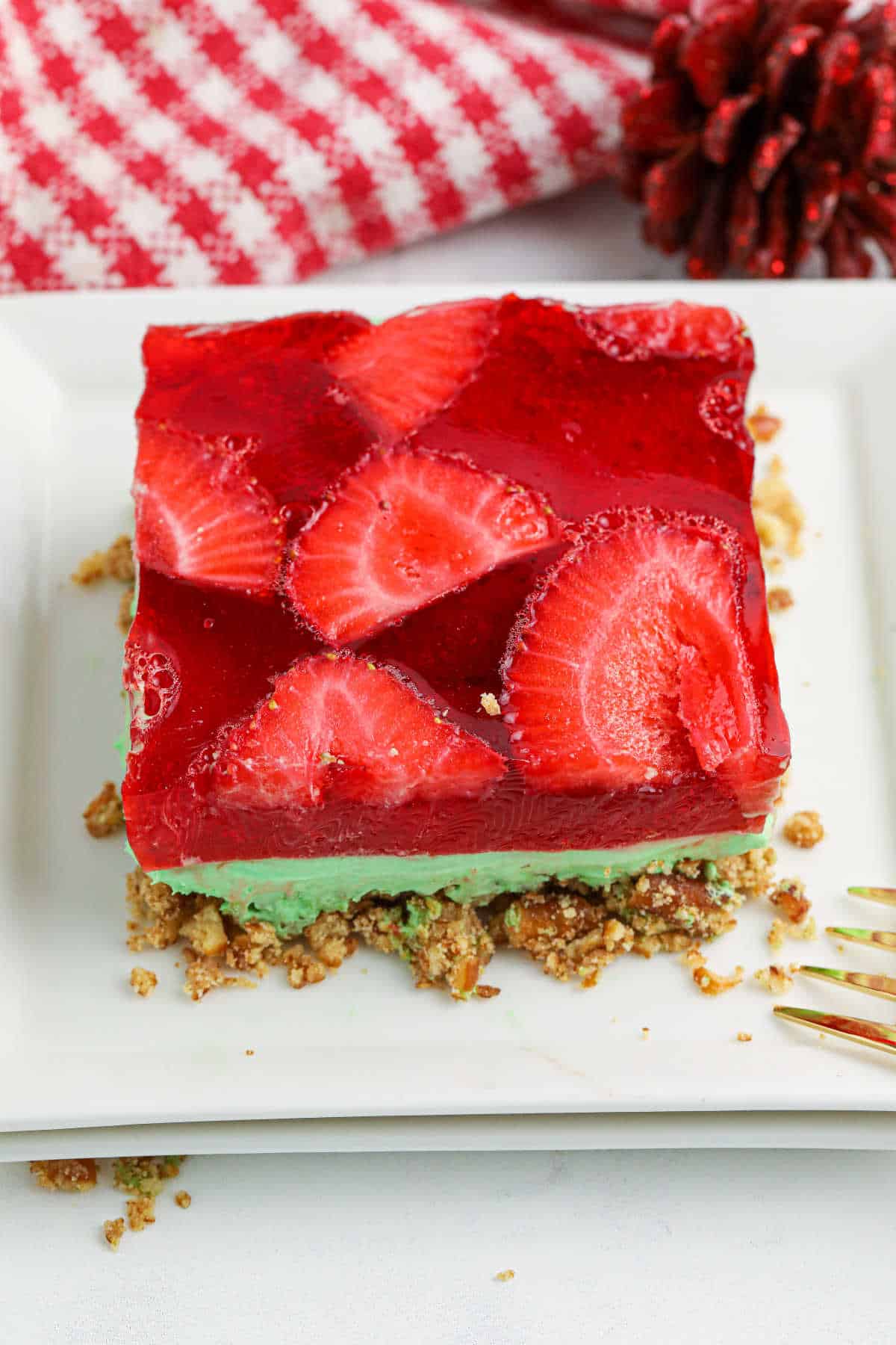 A slice of Christmas Pretzel Salad on a plate.