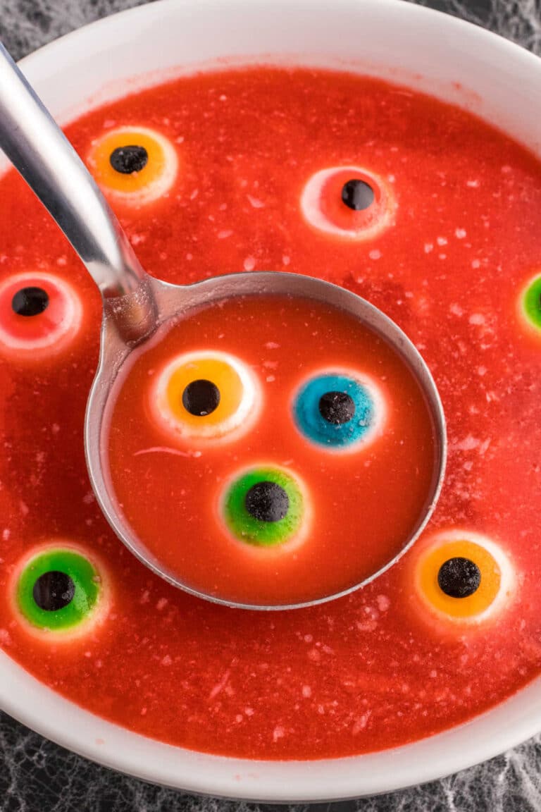 The recipe in a bowl with a ladle.