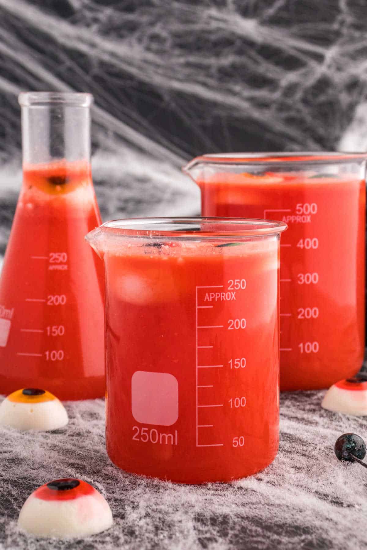 The recipe in beakers.