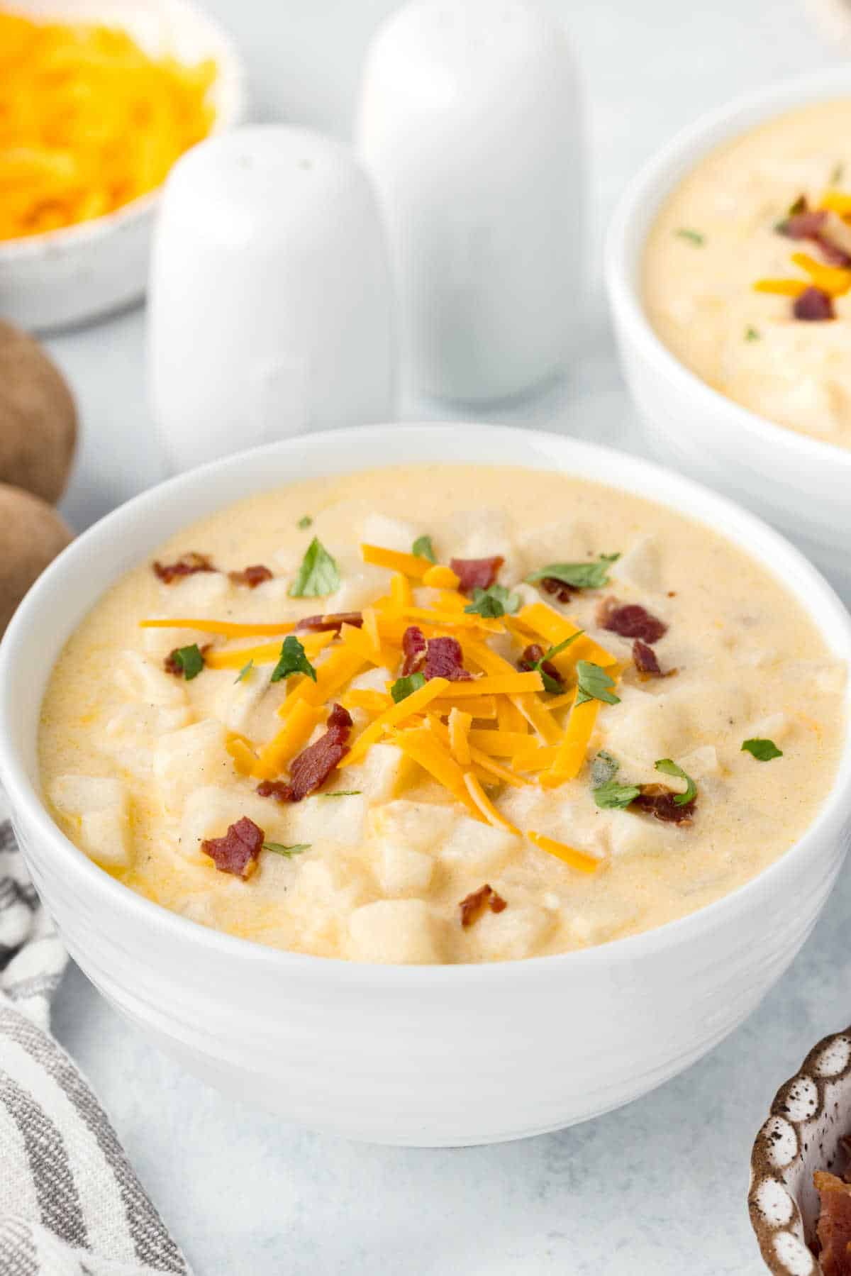 A bowl of hash brown potato soup.