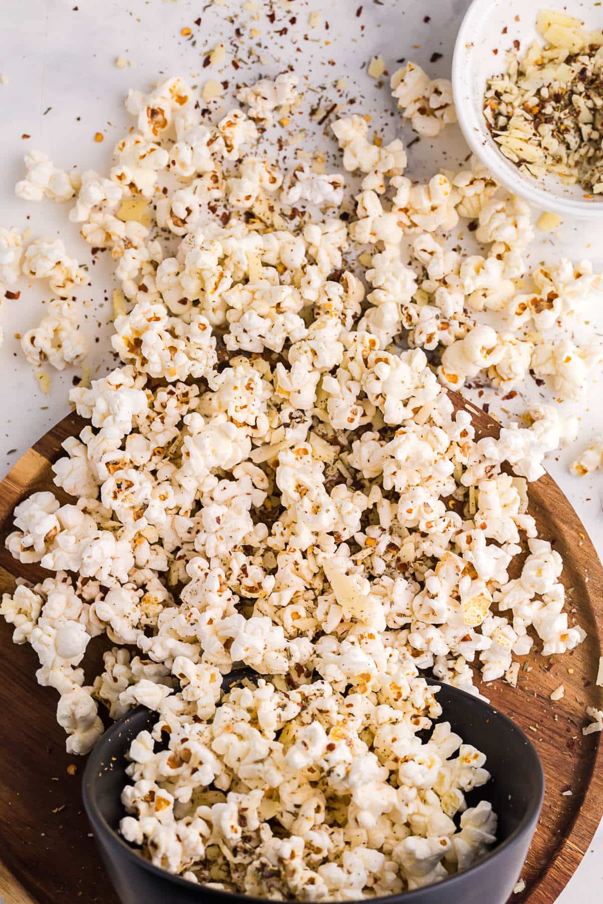 Pizza popcorn being spilled out of the bowl.