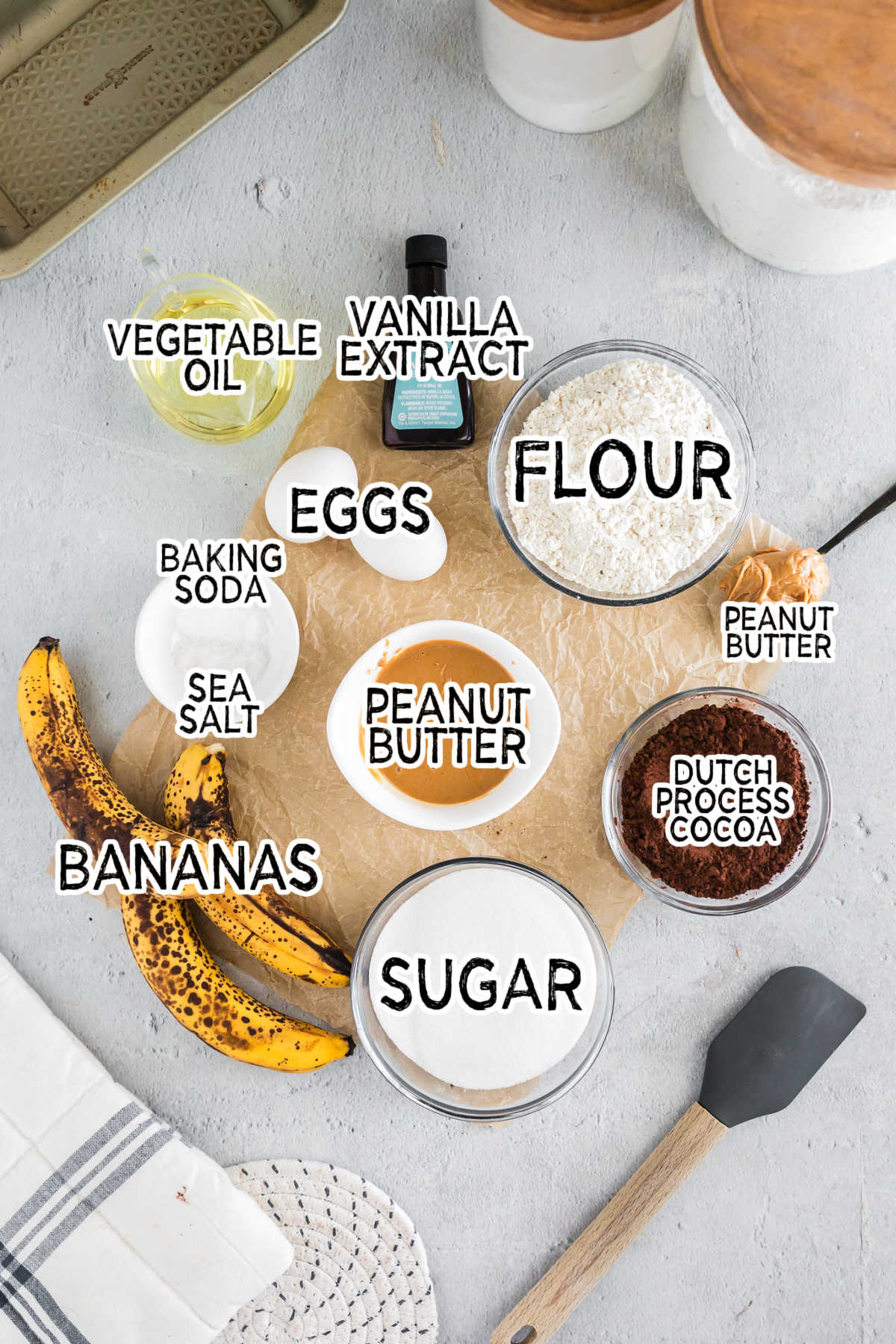 Ingredients to make chocolate peanut butter banana bread.
