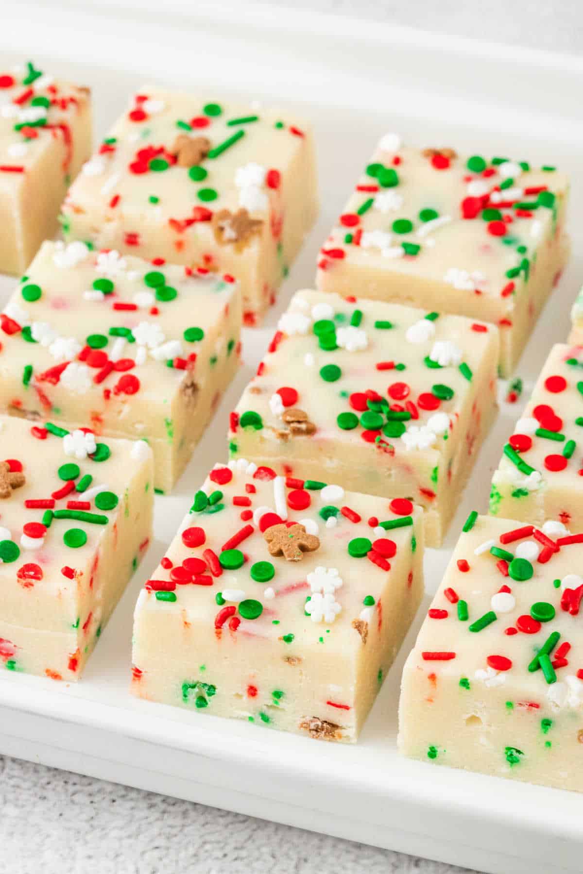 Christmas sugar cookie fudge on a platter.