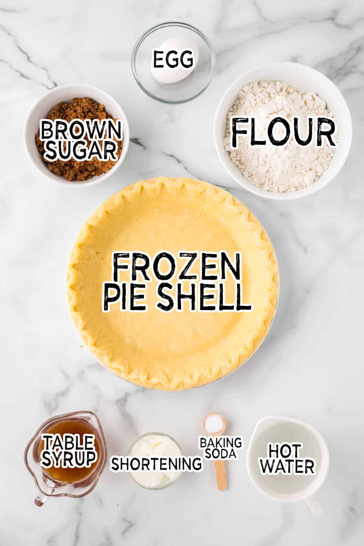 Ingredients on a white marble counter.