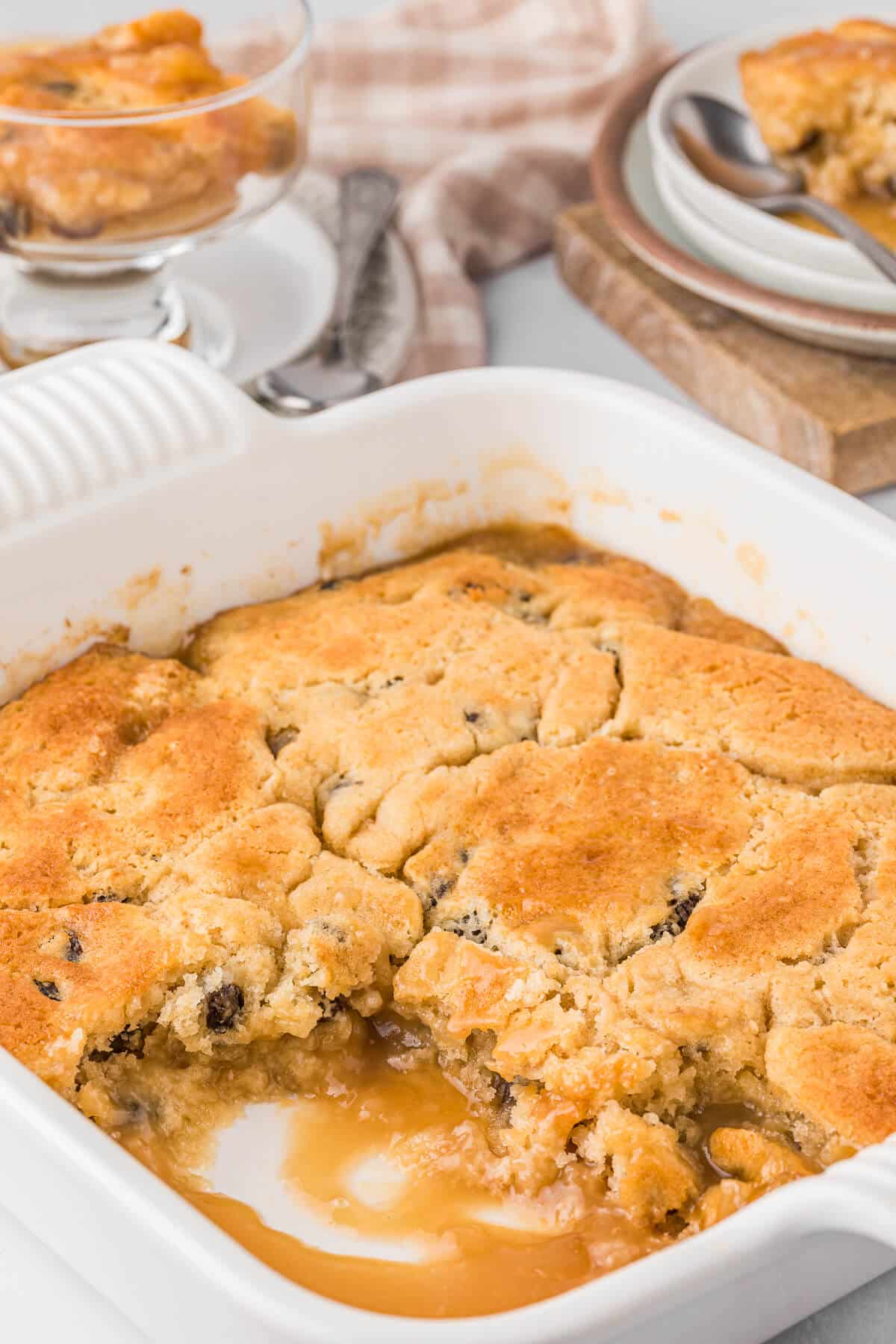 Radio pudding in a pan with a scoop removed.